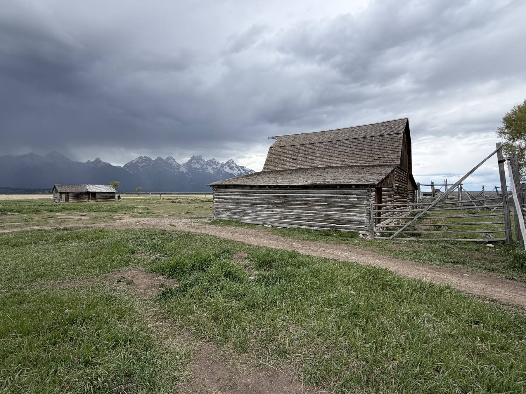A storm over the Teton Range behind the homesteads on Mormon Row, Grand Teton National Park